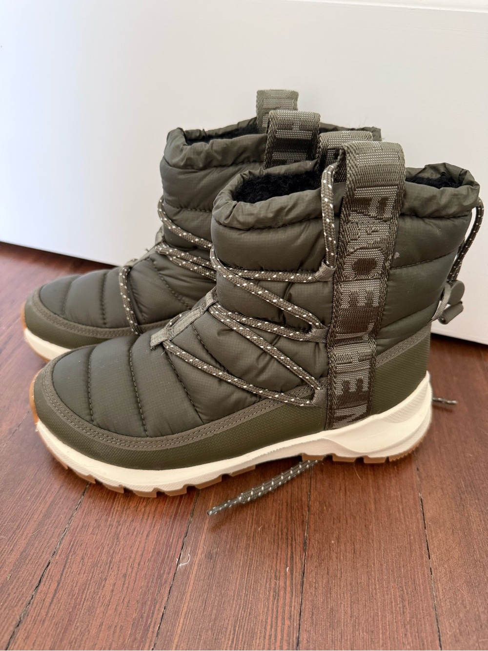 The North Face Olive Quilted Puffer Snow Boots with Contrast Sole